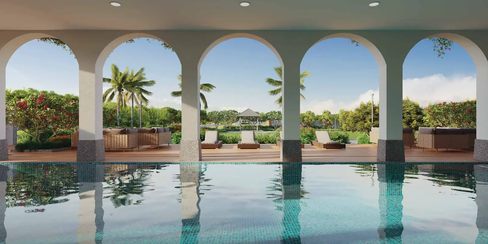 Swimming pool and arched colonnade at The Verdania Enclave clubhouse, Godrej Verdania Estate, Indore